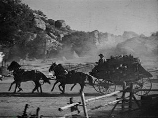 When the "Stagecoach" reaches the burned ferry, John Wayne is on location in Iverson's Ranch - now a parking lot.