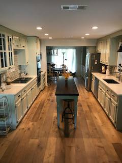  Kitchen Cabinets, Raised panel, Painted - 2 colors, Medium rub finish, Solid Walnut top on Island.