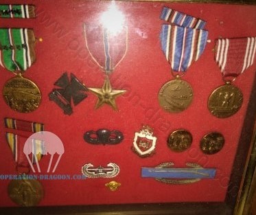 Charlie Bandy military medals for 23 monthes oversea, his parachute wings, gliderborne wings, collars engineer insignias, combat infantry badge and bronze star medal for either heroic achievement, heroic service 