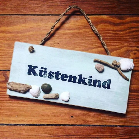 Wandbild *Küstenkind* - kreative Anleitungen: gefaltete Bücher, Tisch