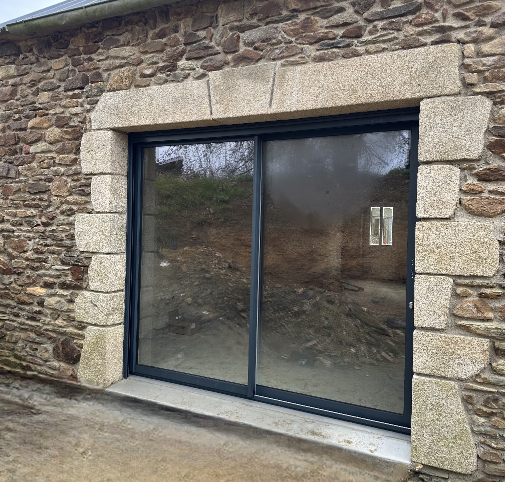 Encadrement baie granit beige 