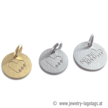 Jewelry tag with engraved logo, matt finishing.