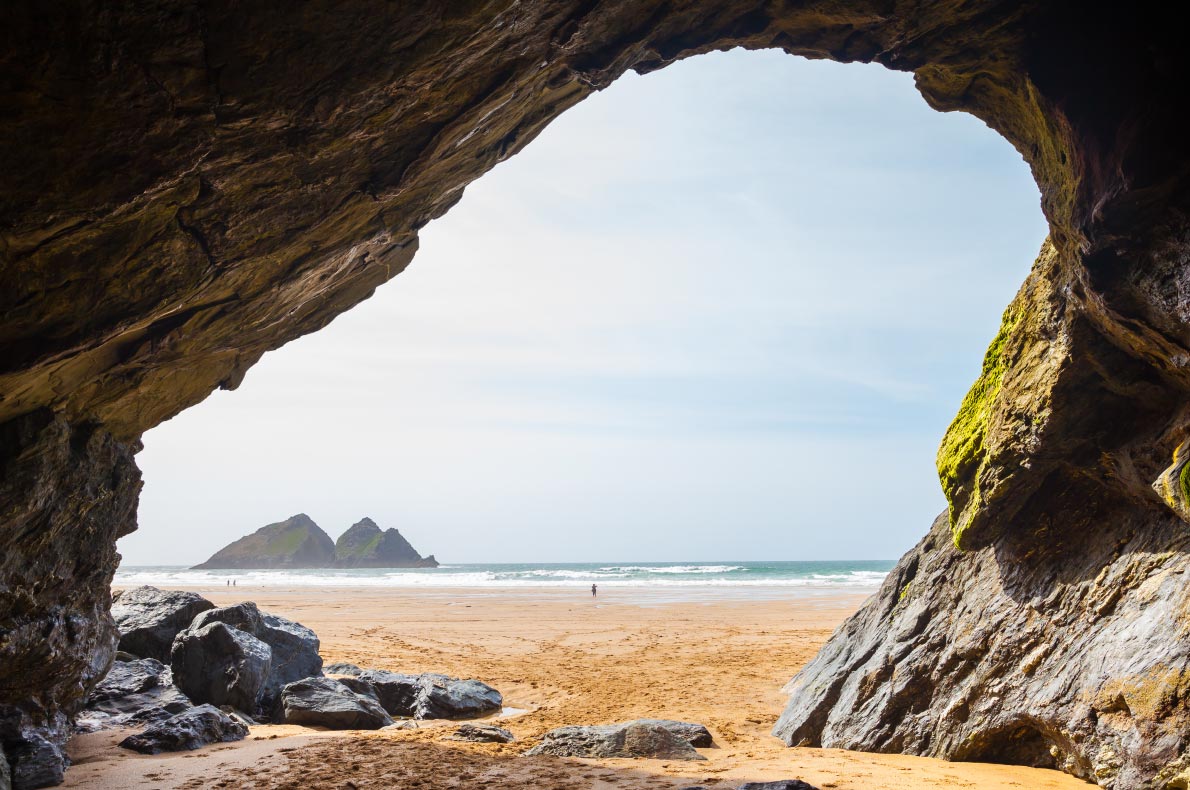 Best beaches in England - Large cave on the golden sandy beach at Holywell Bay Cornwall England UK Europe Copyright ian woolcock- European Best Destinations