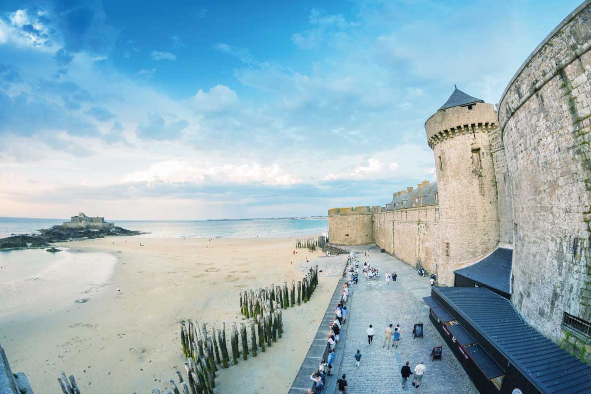 Best fortified destinations in Europe  - Saint Malo beach and city medieval architecture during Low Tide. Brittany, France, Europe Copyright Pisaphotography - European Best Destinations