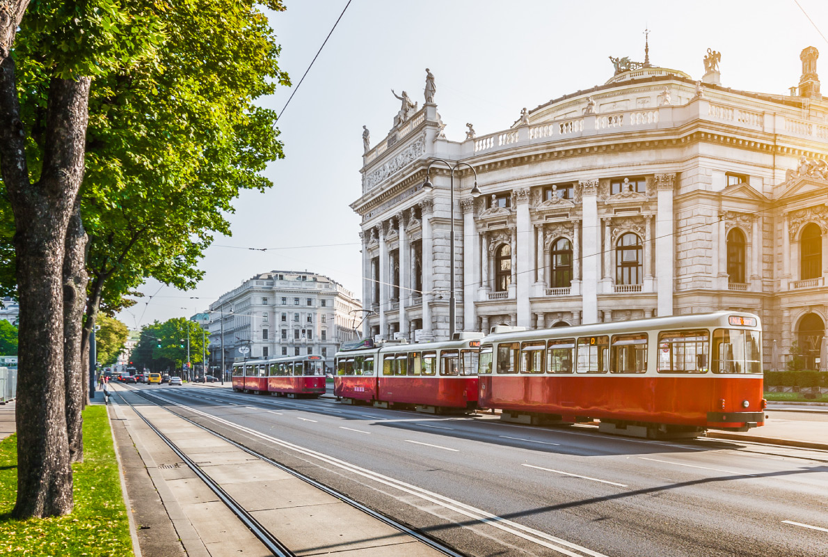 Best trams in Europe -  red electric tram at sunrise with retro vintage Instagram style filter effect in Vienna, Austria Copyright  canadastock   - European Best Destinations