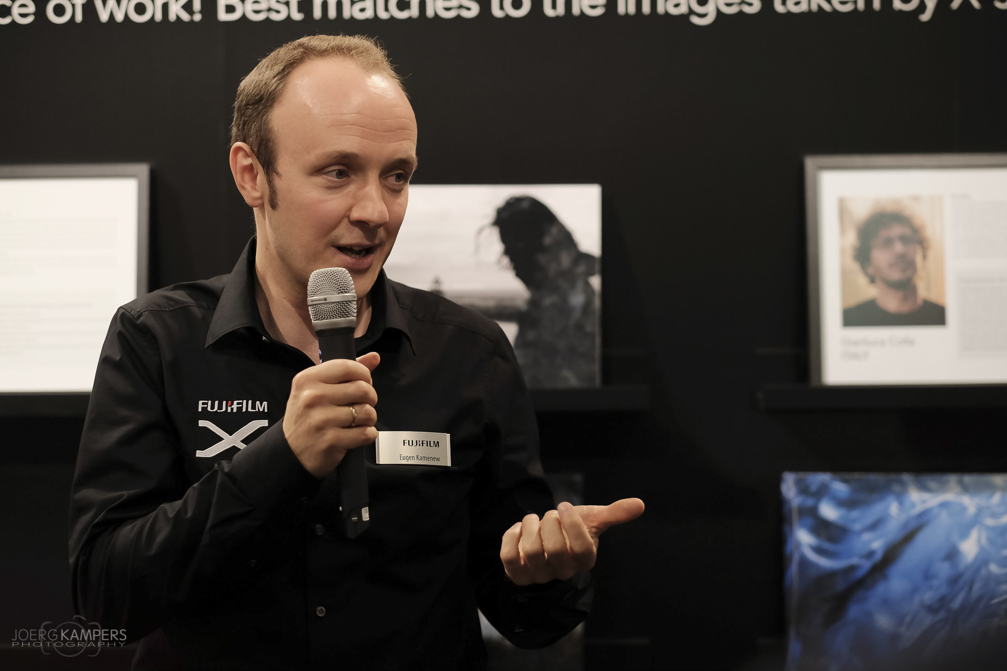 Eugen Kamenew (official Fujifilm X-Photographer) at Photokina 2016 giving a public speech