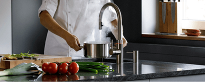 Quooker cadeau bij aankoop van een complete witte keuken met eiland