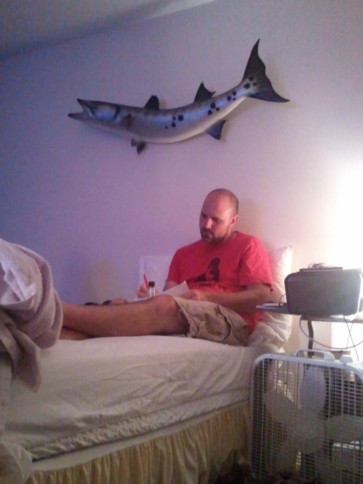 Tony Wash working on his shot list for the next day.  The barracuda was brought to set as an art piece and was hung in Tony and Rob's motel room.  Tony's dad caught that beast!