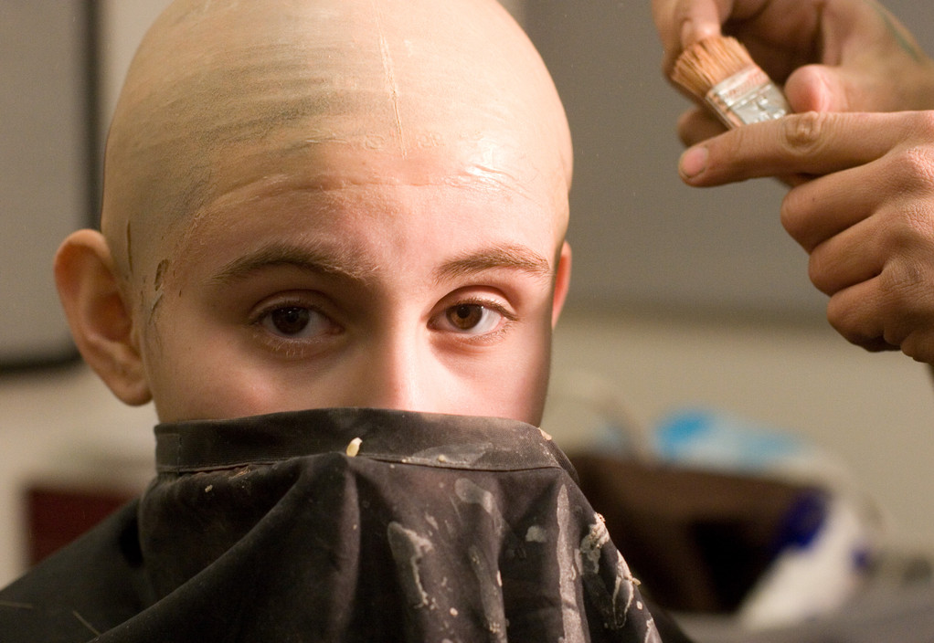 Kendyl Lynch getting her bald cap applied/blended.