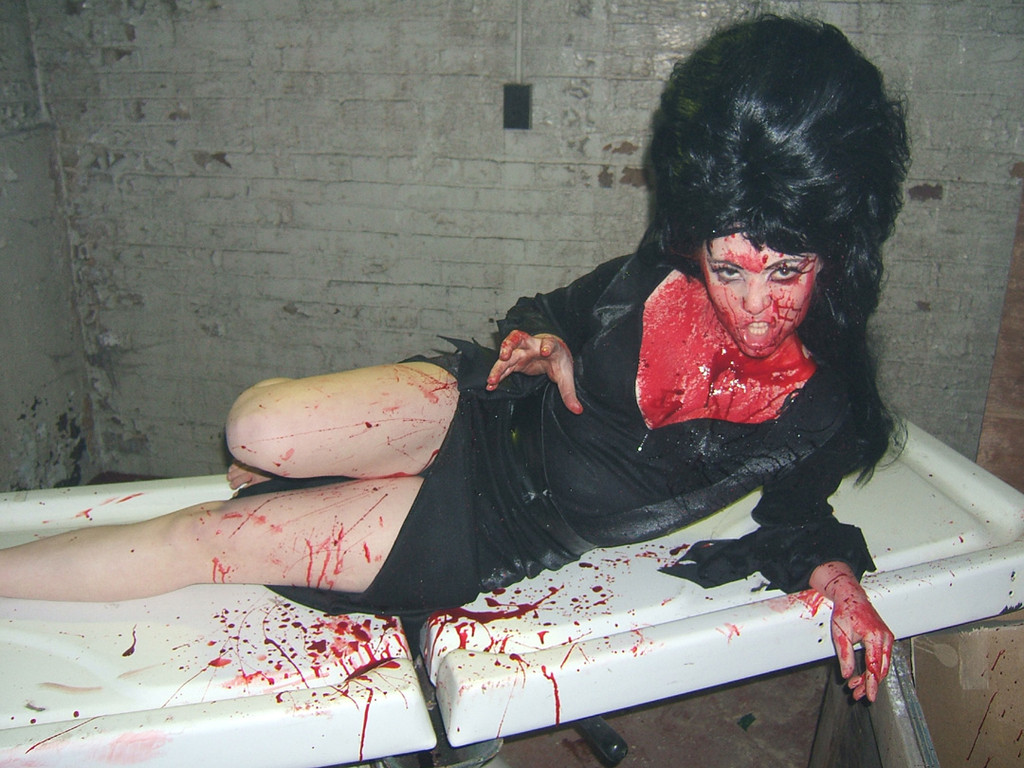 Yes there was a morgue table in the house we shot in, and yes we took pictures on it!