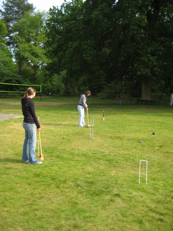 Croquet game on a sunny afternoon