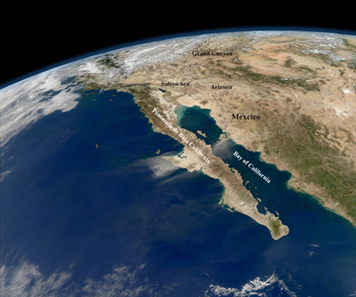 Mostly cloud-free skies and a compelling view of the entire length of Baja California and the Pacific coast of Mexico. In the midst of the clarity, strong northeasterly winds stirred up dust storms on the mainland and the peninsula. ©NASA GSFC.