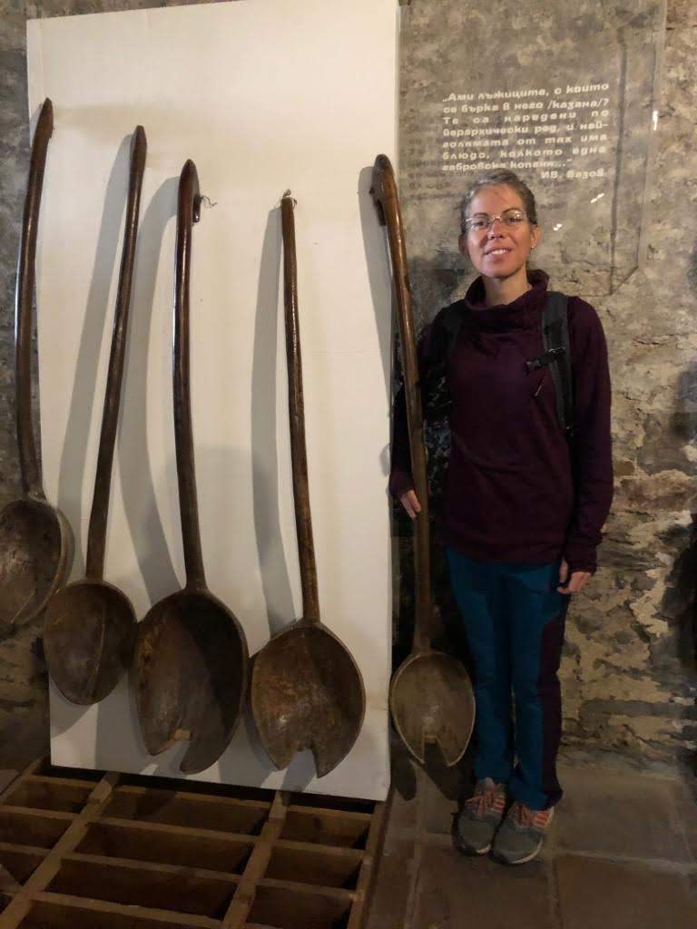 Alison loves to cook so we had to take this picture with the monasteries' big spoons.