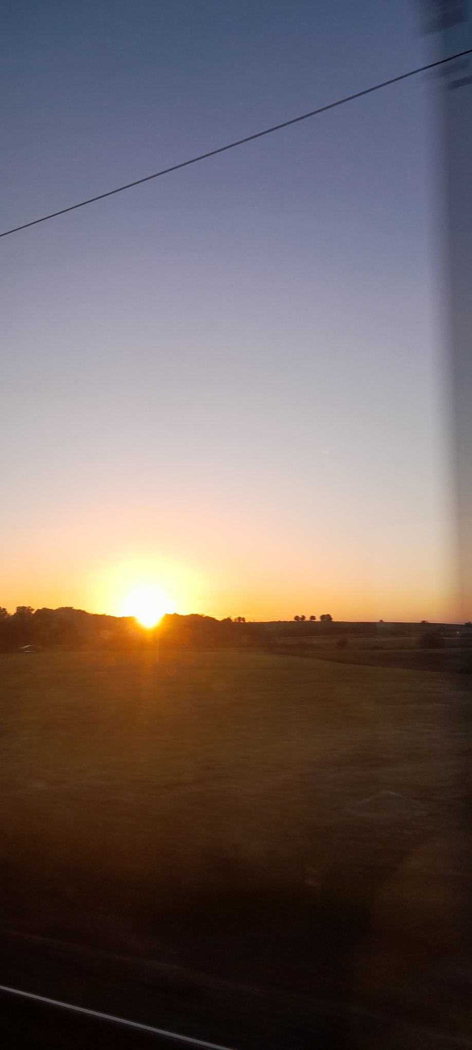 Sonnenuntergang auf der Fahrt nach Dijon