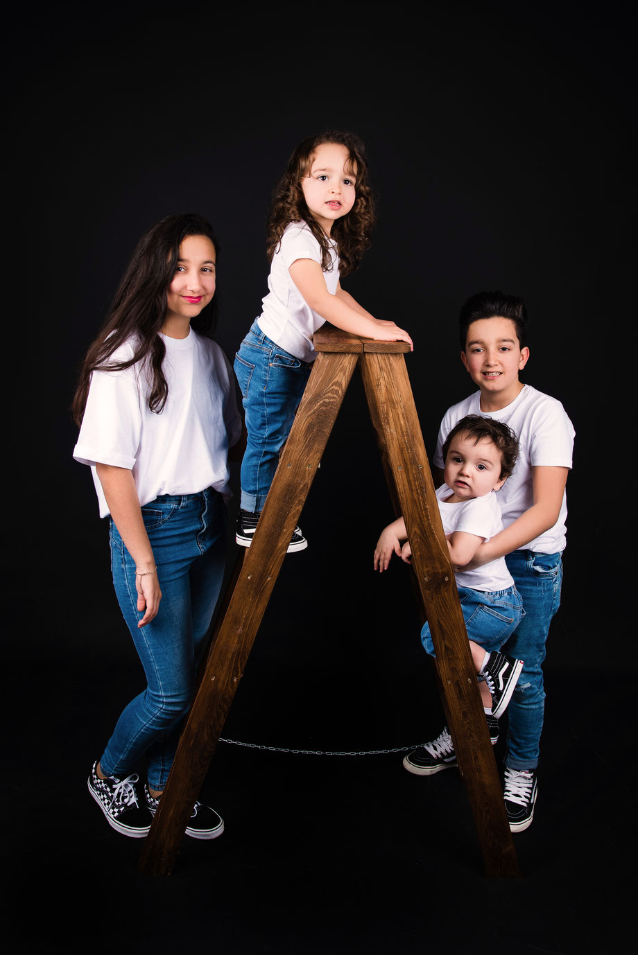 kids shoot with ladder