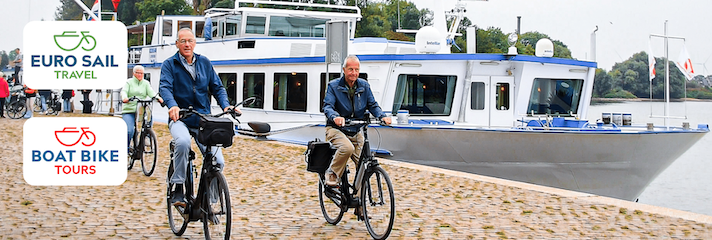 Radfahrer vor der MS POSEIDON