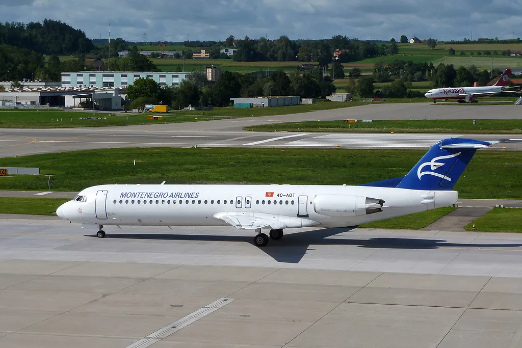4O-AOT Fokker F100 11350  Tay 650-15  Montenegro Airlines 1991  @ Zurigo ZRH 08 2012 © Piti Spotter Club Verona