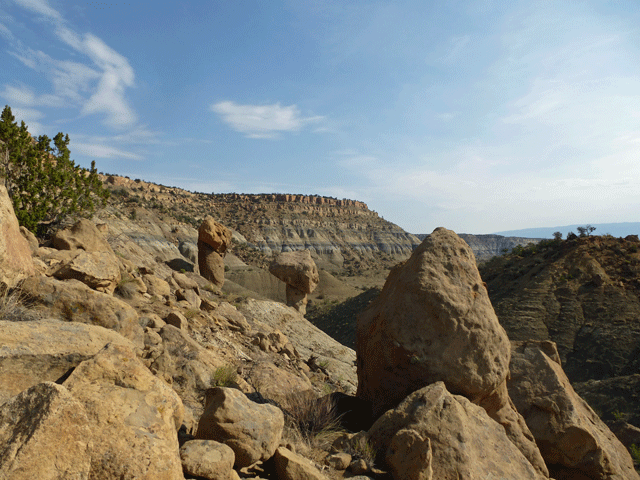 Base of Mesa Portales, balancing rocks, badlands, strata, Continental Divide Trail, BLM land near Cuba, New Mexico