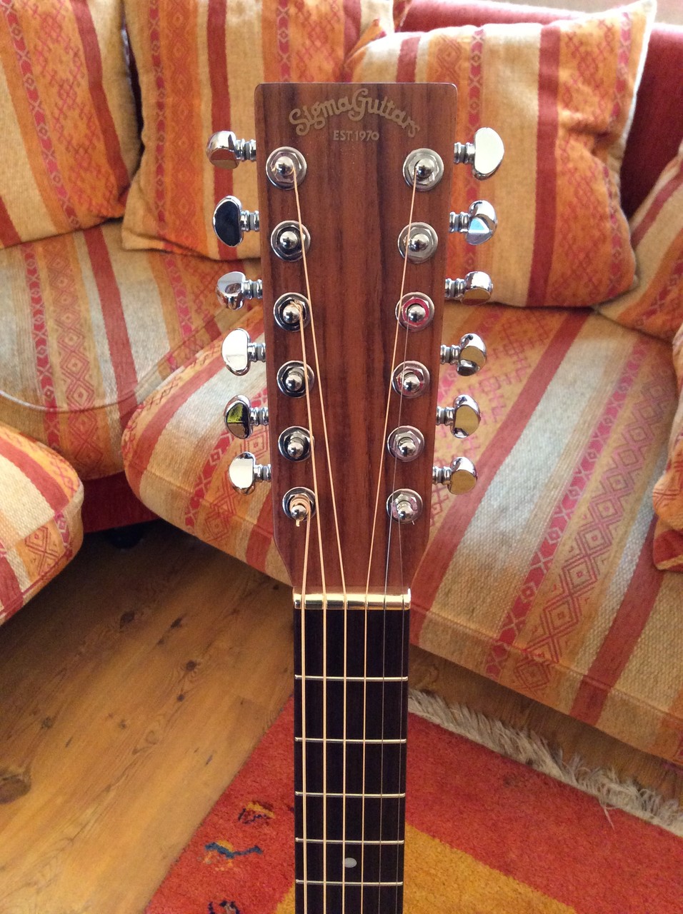Akustik aus 12 mach 6 mit neuem Messingsattel