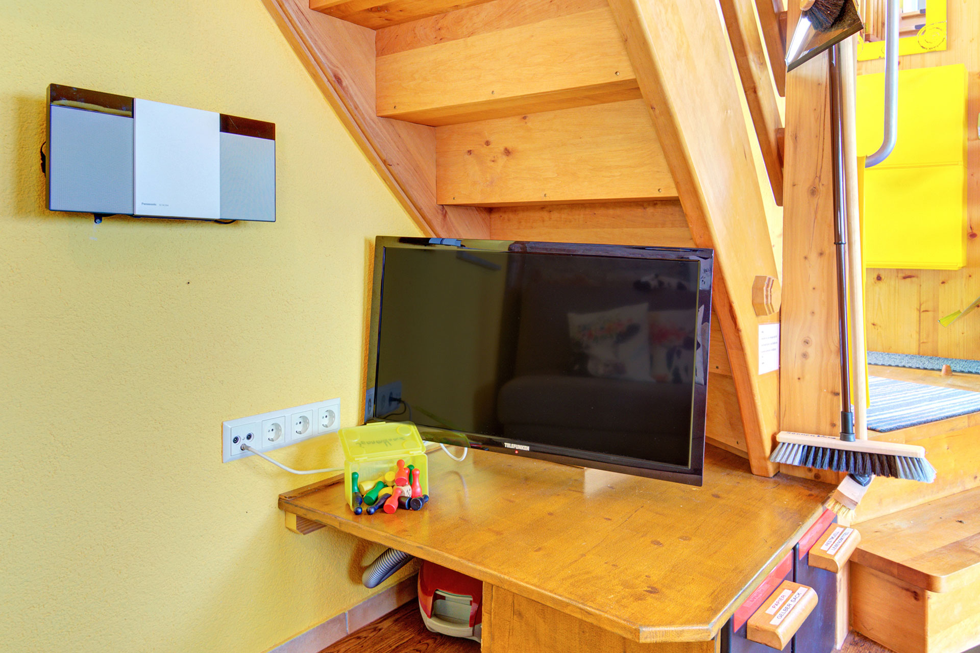 Tv-Monitor mit Spielen in der Ferienwohnung
