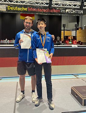 Oliver zusammen mit Trainer Henrik Wolf