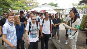 International conference excursion guiding, at the Godaido worship hall approach in Matsushima.