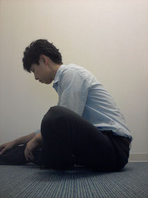 腰痛に悩む奈良県香芝市の男性