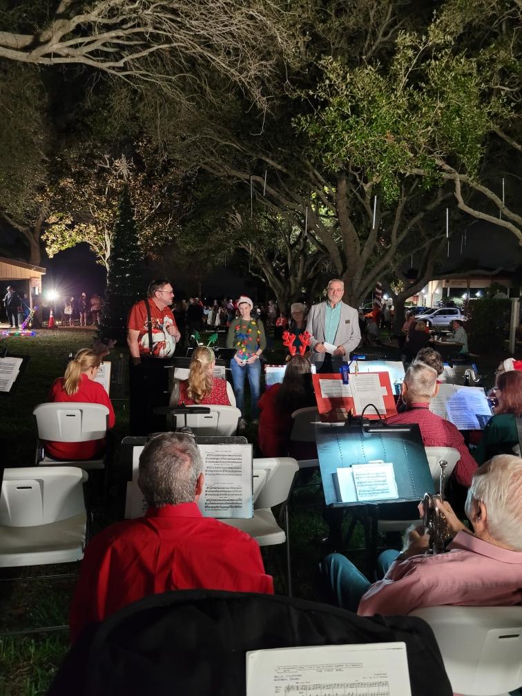 Mayor Arthur Penny greets the band along with his elf, Director of Administration Carley Lewis