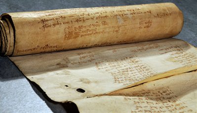 Records of the manorial court were written on parchment (leather) and rolled up  - which is why they are called 'court rolls.'