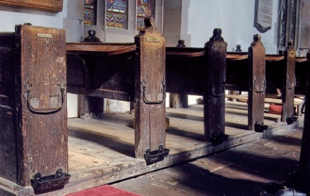 As sermons got longer, the whole of the church was filled with pews fixed to the floor. These are at St Mary the Virgin, Deane, Lancashire.