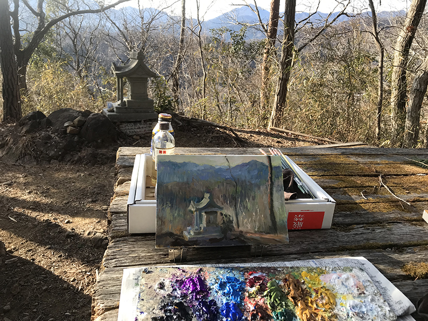 京塚山で油絵を加筆する