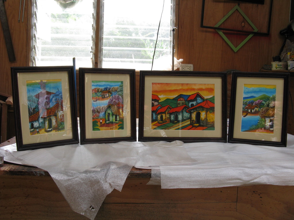 Enmarcados de pinturas en moldura de madera con maría luisa de cartón presentación beige, cartón respaldo y vidrio