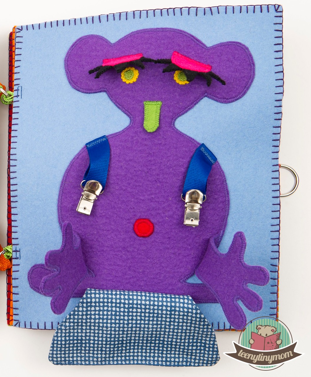 The suspender monster has a belly button hidden underneath its pants. 