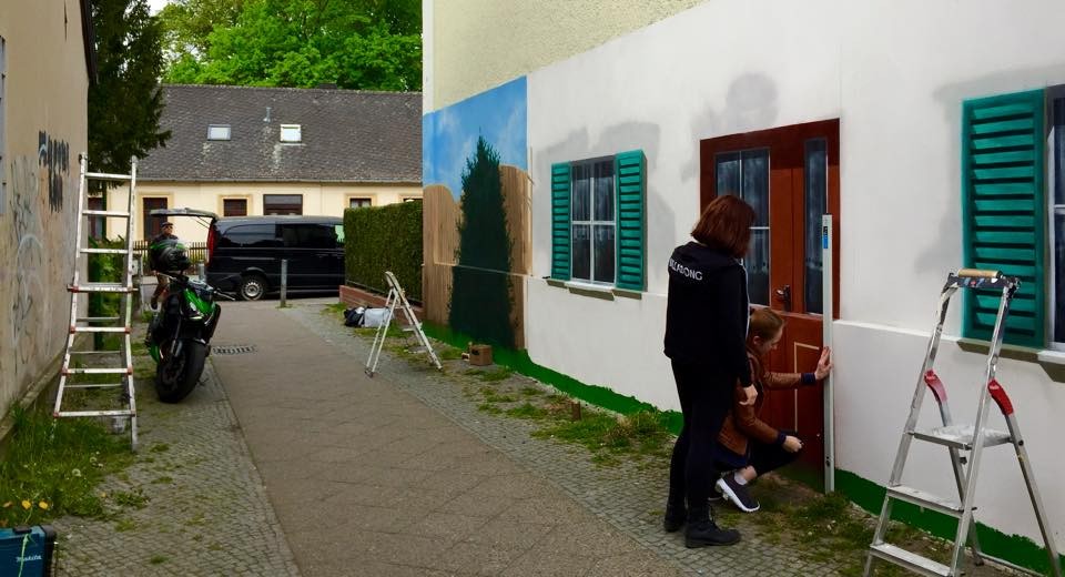 Wandbilder an der Fassadenwand outdoor im Aussenbereich airbrush Graffitikünstler
