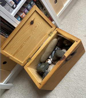 wooden box of rocks