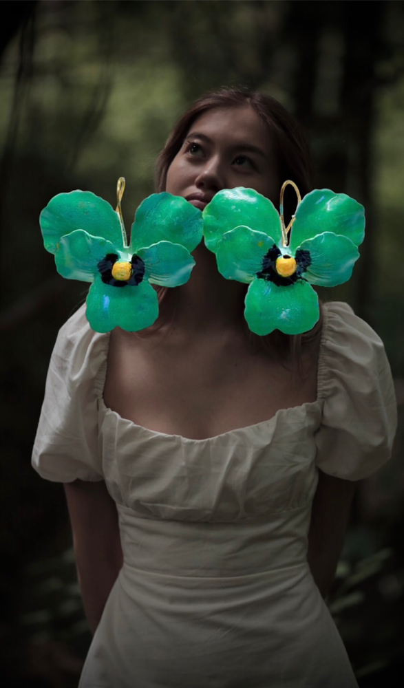 earrings with hand-enamelled violets on metal. Hook closure