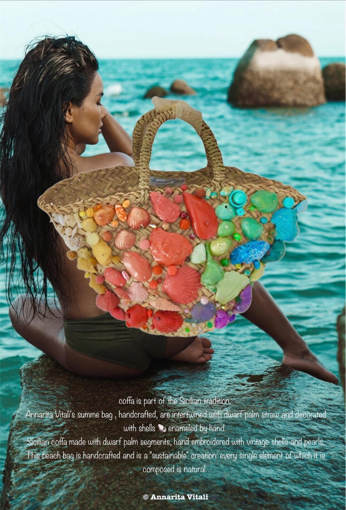 #coffa is part of the Sicilian tradition.  Annarita Vitali's #SummeBag , handcrafted, are intertwined with dwarf palm straw and decorated with shells 🐚 enameled by hand.