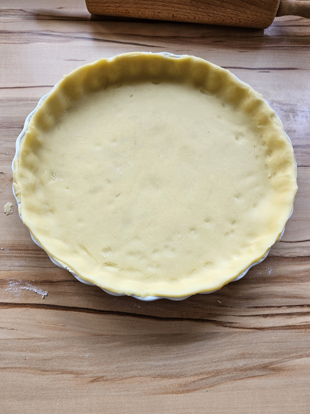 Quiche-Teig in der Tarte-Form für Quiche Lorraine