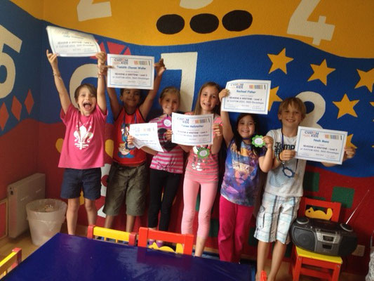Showing off year end Reading and Writing certificates