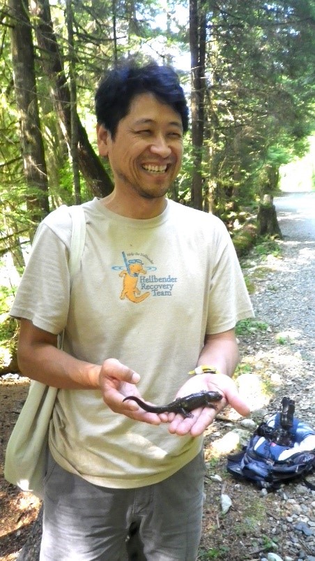 Dr. Okada holding Ambystoma  Gracile (near Vancouver CA at World Congress of Herpetology)