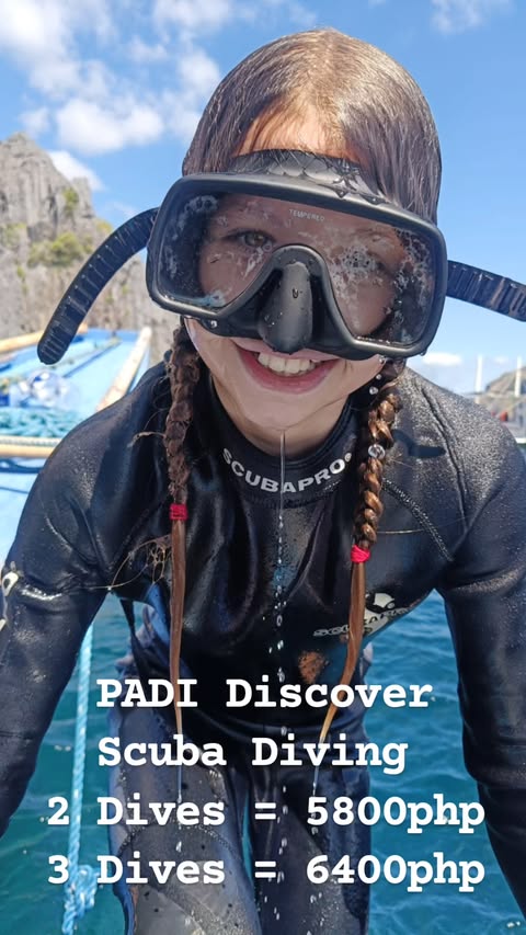 Close up of a Smiling Girl wearing Scuba Mask and Wetsuit in El Nido, Palawan