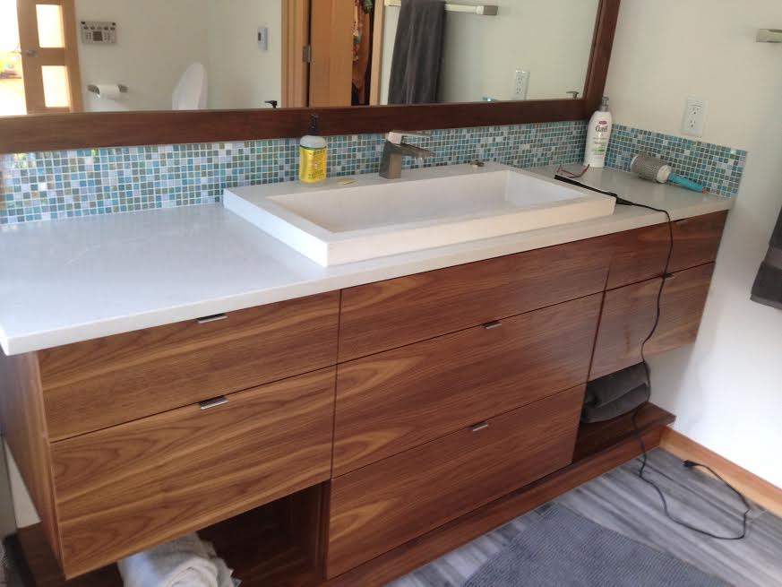 Sleek, contemporary walnut vanity.  Cabinet pulls provided by Kegg's Kreations.