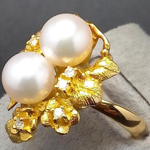 18K gold ring with 2 pearls and 5 melee diamonds