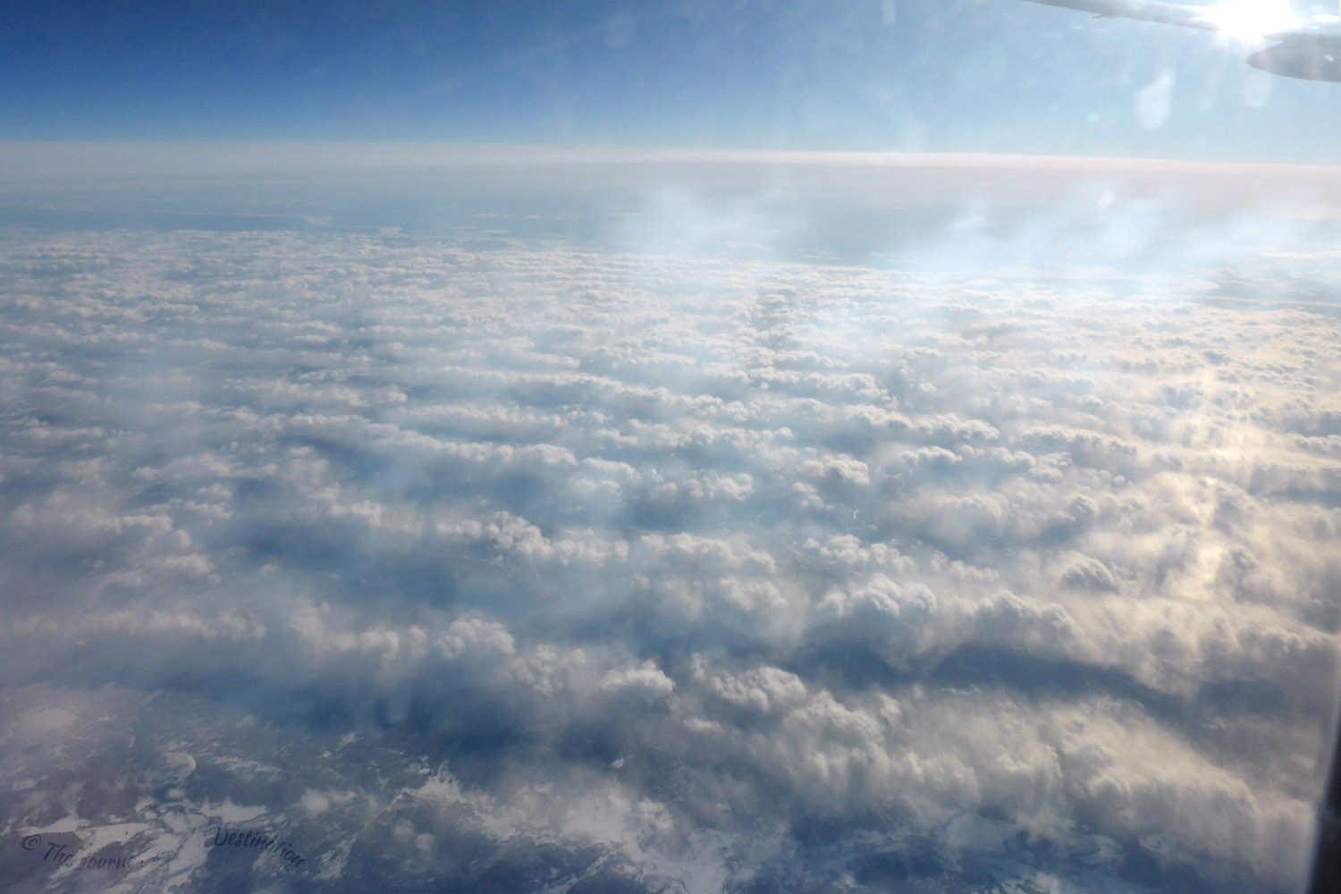 Cloud streets over a frozen landscape