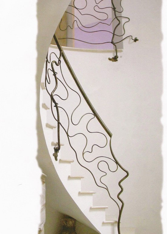 Escalier   tout en arrondi rampe moderne