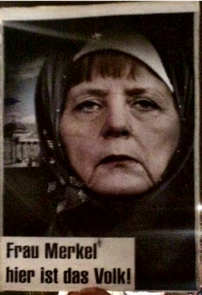 A placard of chancellor Angela Merkel in a hijab