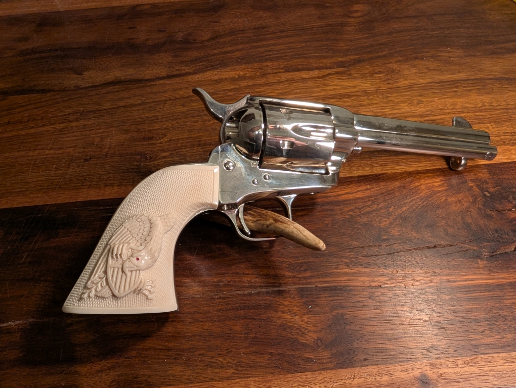 Colt SAA with carved grips 