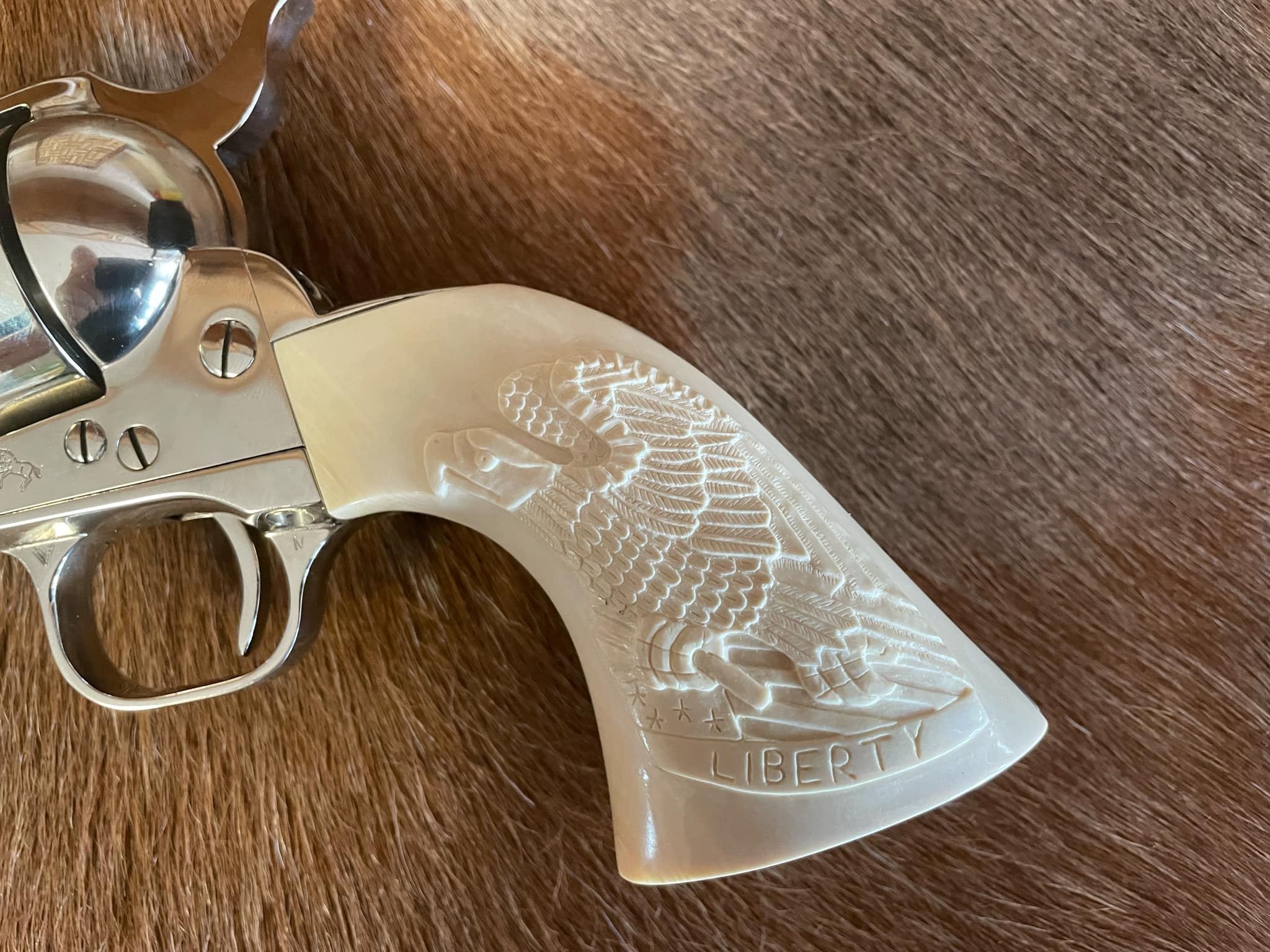 Colt SAA with carved mammoth ivory grips