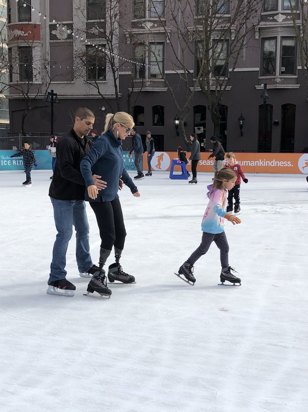 Enjoying life again after losing her limbs to a sepsis: Wendi with her family (picture courtesy of Wendi Locatelli)