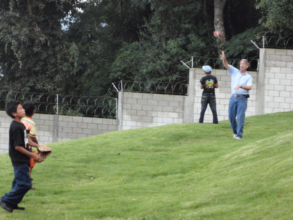 kerrie's dad roger visited us - playing with the Rhinos